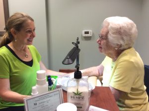 Phyllis Ussery, Manicurist pampers Eileen Herbermann, Springmoor resident, with a new nail color and a hand massage