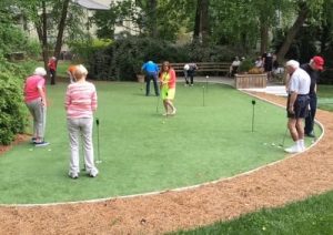 Putting on the Green provides a morning of friendly competition between neighbors